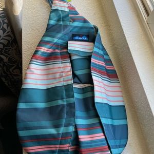 Kavu blue and pink striped rope sling bag